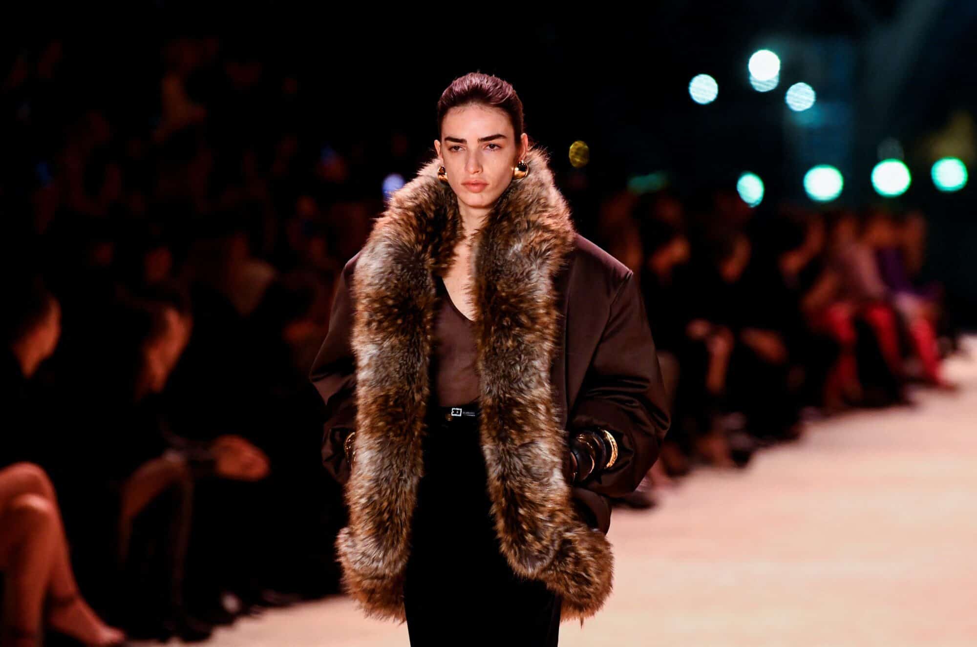 Yves Saint Laurent sends silky evening gowns down Eiffel Tower runway