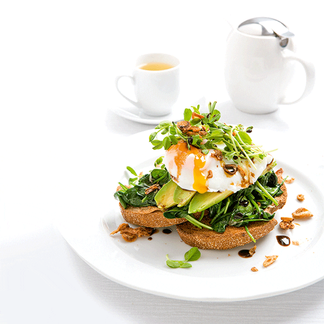 Rye Toast with Poached Free-Range Eggs, Wilted Spinach, Avocado and Sprouts