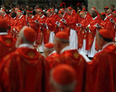 Cardinals attend a mass in St. Peter's Basilica at the Vatican. REUTERS