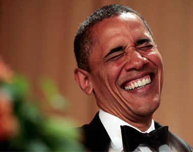 President Barack Obama laughs at comedian Jimmy Kimmel at the White House Correspondents Association annual dinner in Washington. REUTERS/Larry Downing