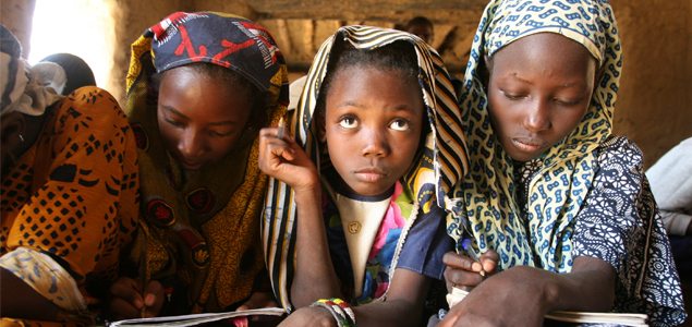 Girls attend class at an Islamic school in Gao, eastern Mali, November 16, 2006. The number of Islamic schools, or Madrasas, in the area has grown from about 15 to 41 in the past three years, with new ones springing up in areas where state schools are lacking. REUTERS/Luc Gnago