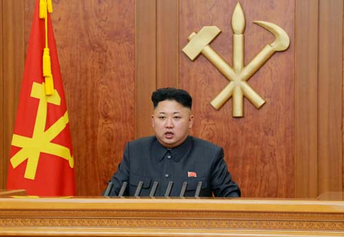 North Korean leader Kim delivers a speech during his New Year address in this undated photo released by Kyodo