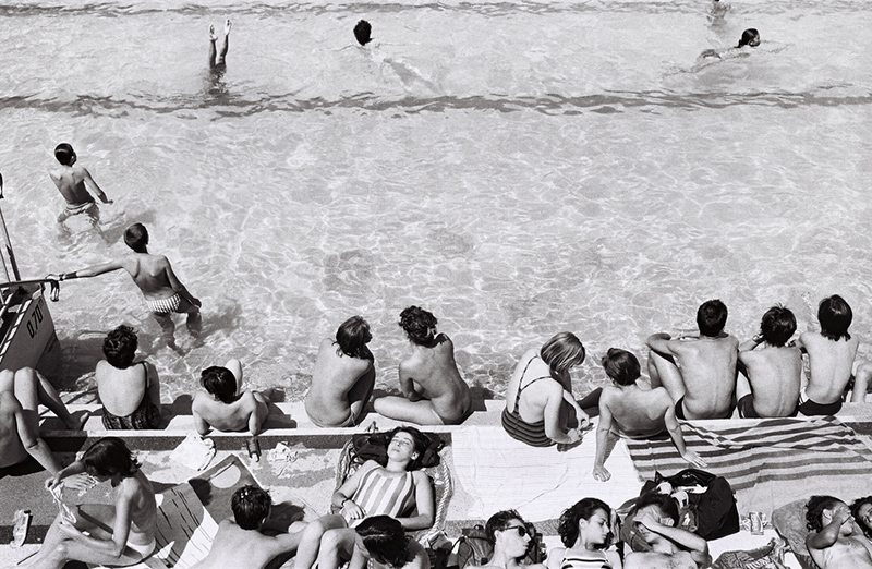 Four years before its closure, swimmers enjoy a poolside spot