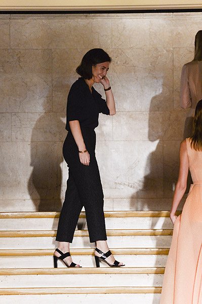 Designer Emilia Wickstead takes a bow after presenting her Spring-Summer 2015 collection.