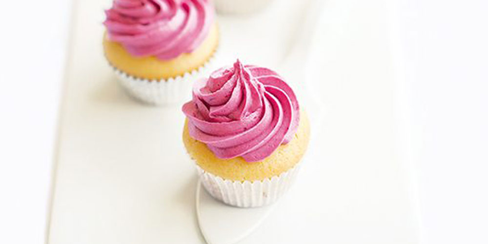 White Chocolate Cupcakes with Blackberry Buttercream