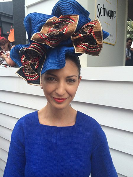 Kayla Baggio wearing Saba and hat by Geannie Todaro.