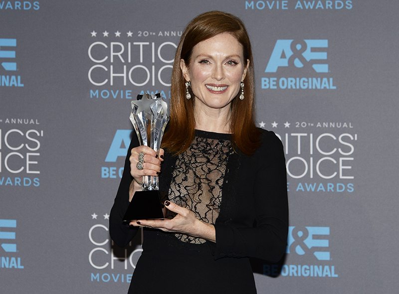 Julianne Moore poses with her award during the 20th Annual Critics' Choice Movie Awards in Los Angeles