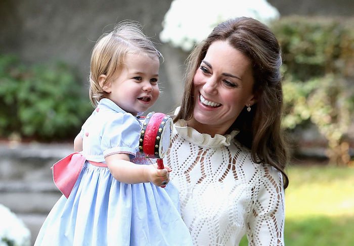 VICTORIA, BC - SEPTEMBER 29:  Catherine, Duchess of Cambridge and Princess Charlotte of Cambridge at a children's party for Military families during the Royal Tour of Canada on September 29, 2016 in Victoria, Canada. Prince William, Duke of Cambridge, Catherine, Duchess of Cambridge, Prince George and Princess Charlotte are visiting Canada as part of an eight day visit to the country taking in areas such as Bella Bella, Whitehorse and Kelowna  (Photo by Chris Jackson - Pool/Getty Images)