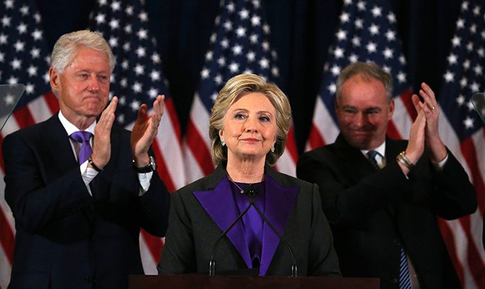 New York, UNITED STATESHillary Clinton addresses her staff and supporters about the results of the U.S. election as former U.S. President Bill Clinton (L) and her running mate Tim Kaine applaud at a hotel in the Manhattan borough of New York, U.S., November 9, 2016. REUTERS/Carlos Barria