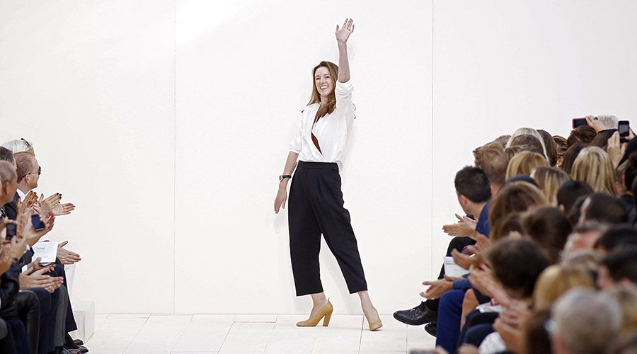 British-born designer Clare Waight Keller appears at the end of her Spring/Summer 2013 women's ready-to-wear fashion show for French fashion house Chloe during Paris fashion week October 1, 2012. REUTERS/Benoit Tessier (FRANCE - Tags: FASHION) - RTR38NSP