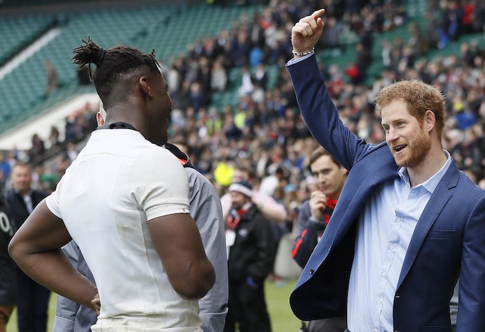 Britain's Prince Harry speaks with Maro Itoje during a visit to an England Rugby Squad training session at Twickenham Stadium in London, Britain, February 17, 2017. REUTERS/Kirsty Wigglesworth/Pool
