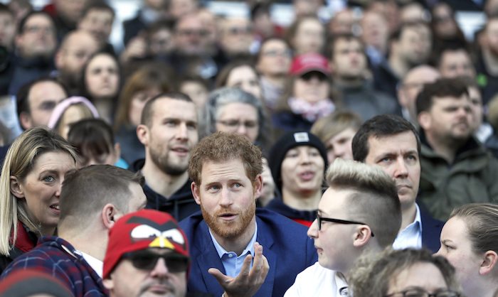 Britain's Prince Harry speaks with people from the RFU Try for Change programme during a visit to an England Rugby Squad training session at Twickenham Stadium in London, Britain, February 17, 2017. REUTERS/Kirsty Wigglesworth/Pool