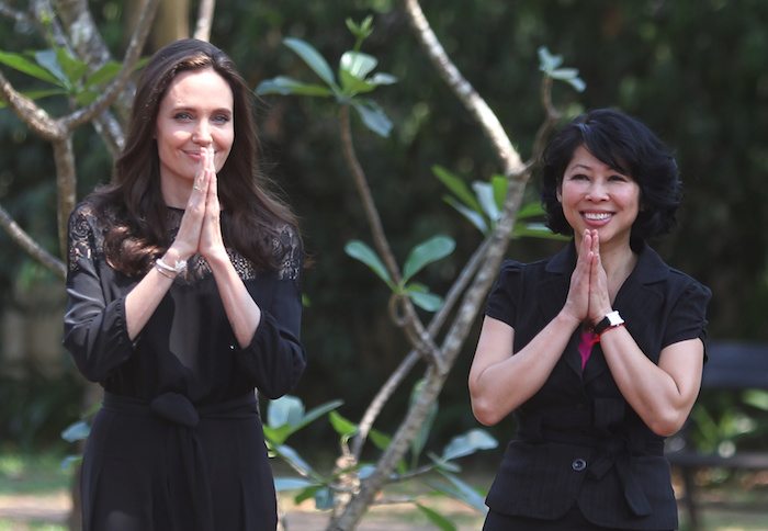 Actress Angelina Jolie (L) and Cambodian-born American human-rights activist and lecturer Loung Ung greet as they arrive for a news conference at hotel in Siem Reap province, Cambodia, February 18, 2017. REUTERS/Samrang Pring 