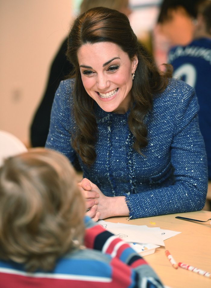 Britain's Catherine the Duchess of Cambridge speaks to a child at the Ronald Mc Donald House, the accommodation for families of children being treated at Evelina's children's hospital in London, Britain, February 28, 2017. REUTERS/Jeremy Selwyn/Pool - RTS10SGB