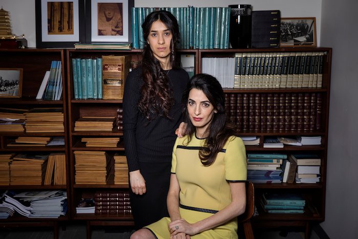 Yazidi survivor Nadia Murad poses for a portrait with international human rights lawyer Amal Clooney at United Nations headquarters in New York
