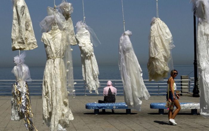 The macabre wedding dress protest on Beirut's sea front, by Lebanese artist Mireille Honein