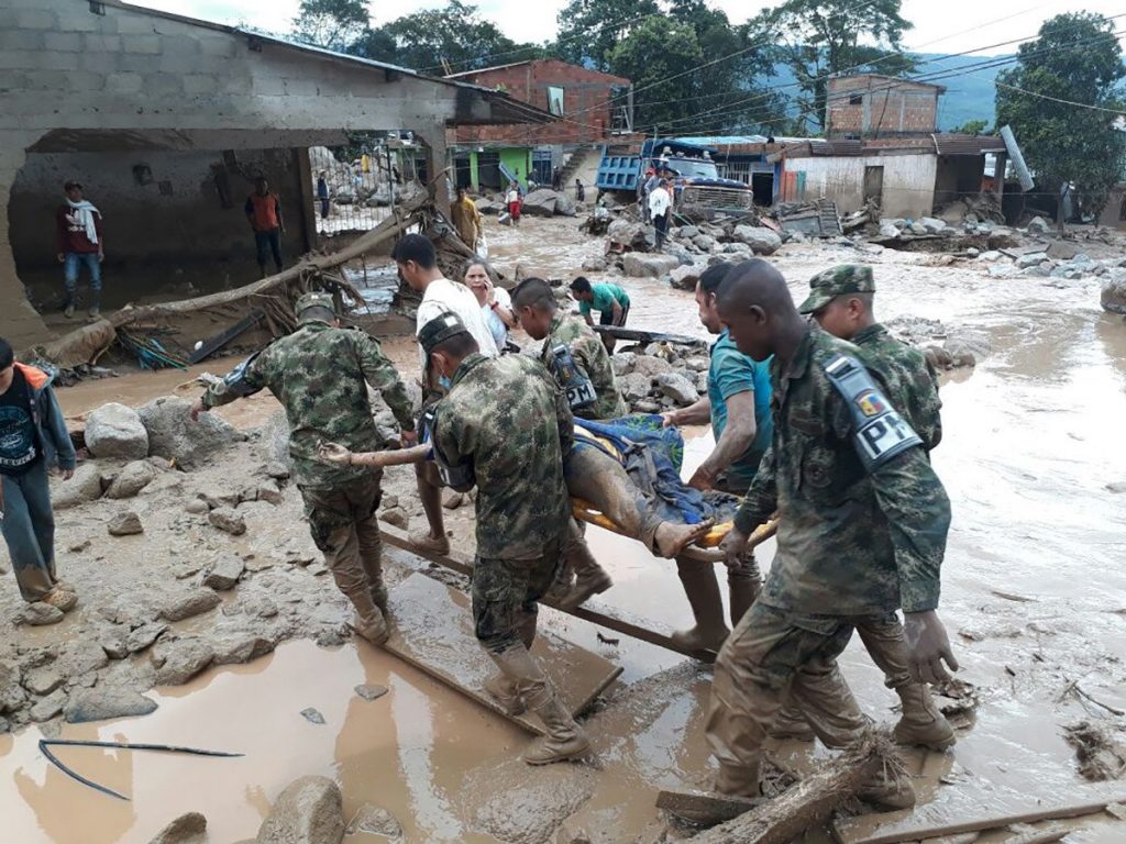 Colombian soldiers rushed to Mocoa to help locals after a mudslide killed more than 200 people