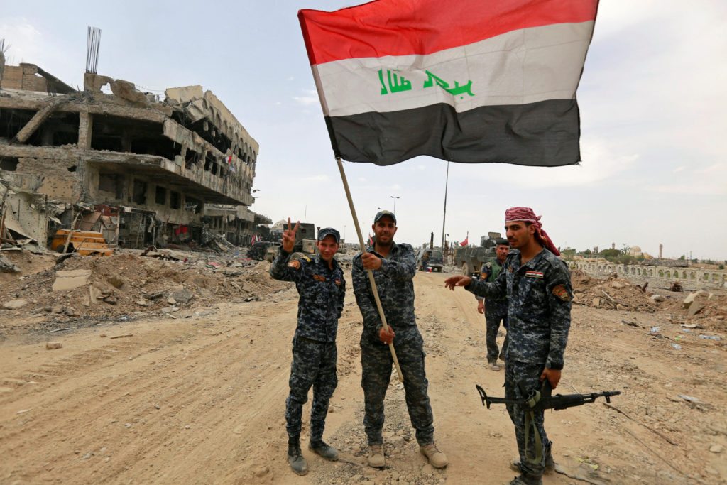 Iraqi Federal Police celebrate in the Old City of Mosul, Iraq July 8, 2017. REUTERS/Ahmed Saad