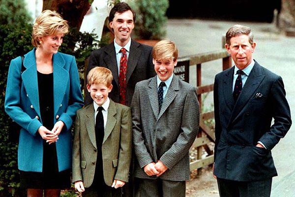 The Prince and Princess of Wales with Prince Harry, Prince William and housemaster Dr Andrew Gayley in 1995.