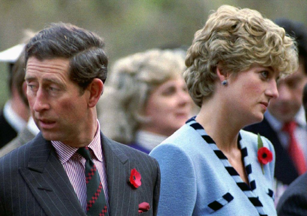 Princess Diana and Prince Charles look in different directions during a Korean War commemorative service in November 1992. 
(REUTERS)