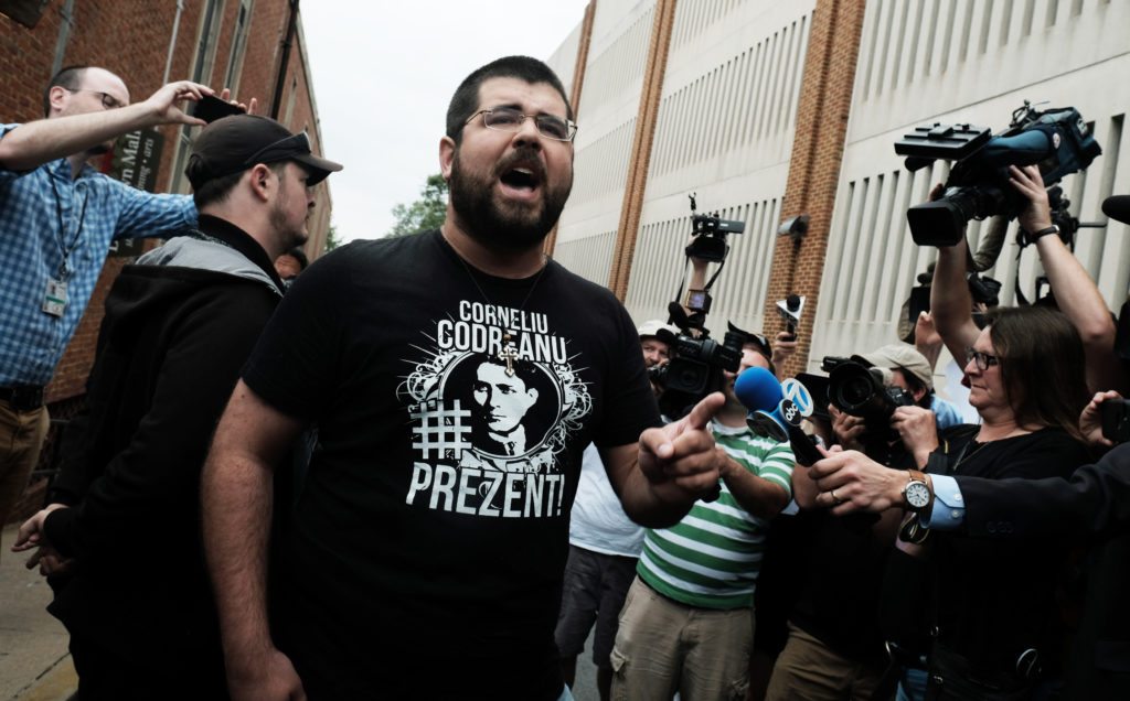 White nationalist leader Matthew Heimbach screams at the media outside Charlottesville General Courthouse in defense of James Alex Fields Jr.  (REUTERS/Justin Ide)