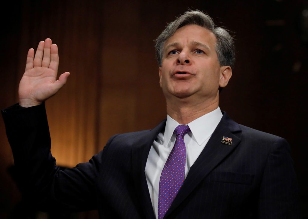Christopher Wray is sworn in prior to testifying before a Senate Judiciary Committee confirmation hearing on his nomination to be the next FBI director on Capitol Hill in Washington, U.S., July 12, 2017. REUTERS/Carlos Barria   