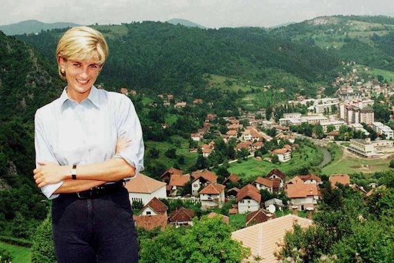 Diana smiles for the camera with the Bosnian town of Olovo in the background.