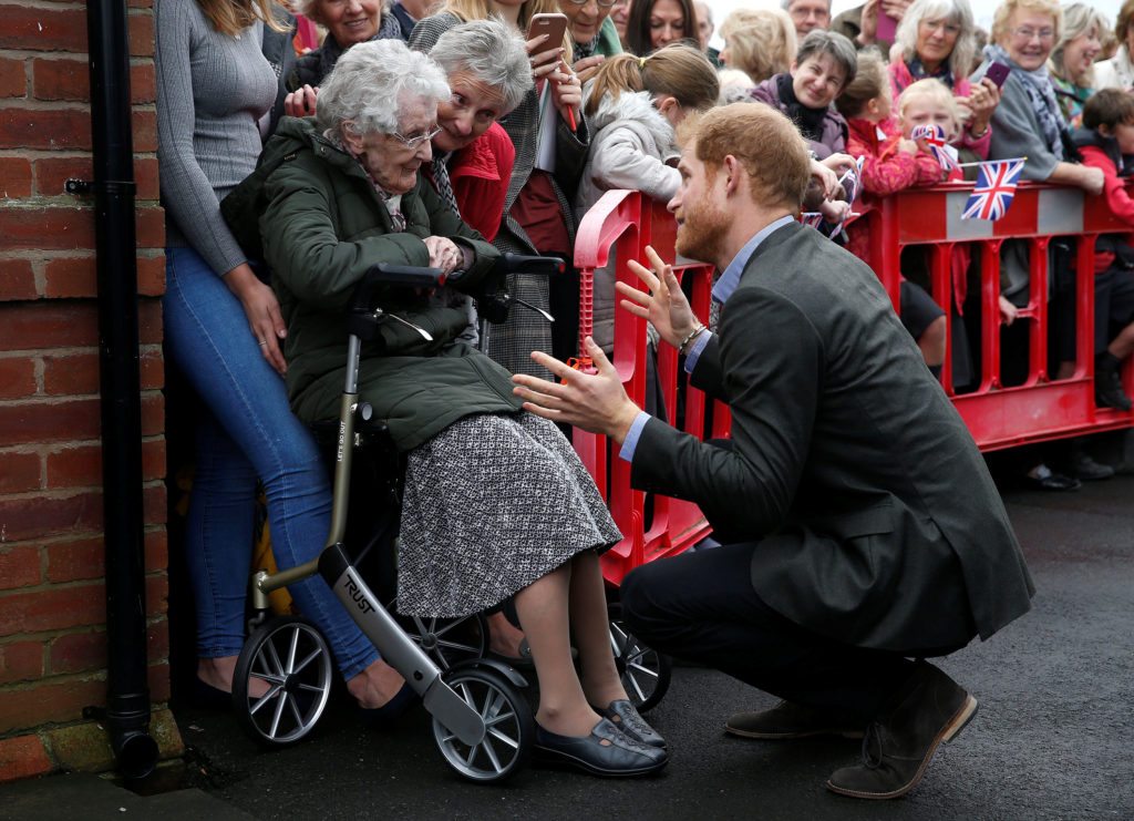 Prince Harry meets Winnie Hodson during his visit to St Michael's on Wyre village hall in Lancashire, Britain October 23, 2017. 