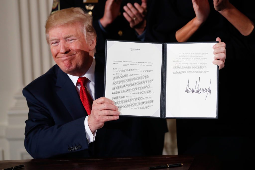 Trump displays a presidential public health emergency declaration on the nation's opioid crisis, October 26, 2017. 