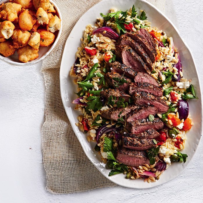 Greek-Style Lamb With Orzo And Roasted Tomato Salad