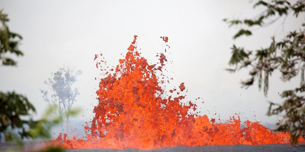 Lava erupts on the outskirts of Pahoa during ongoing eruptions of the Kilauea Volcano in Hawaii, U.S., May 19, 2018.  REUTERS/Terray Sylvester - RC14B5BBAFC0