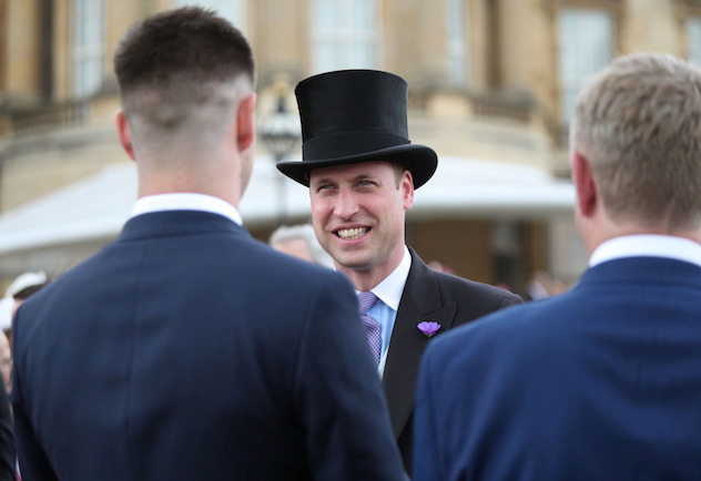 The Duke of Cambridge meets guests during a garden party at Buckingham Palace in London Yui Mok/Pool via REUTERS 