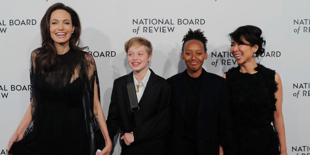 Actor Angelina Jolie (L) arrives with Shiloh Jolie-Pitt (2nd L), Zahara Jolie-Pitt (2nd R) to attend the National Board of Review awards gala in New York, U.S., January 9, 2018.  REUTERS/Lucas Jackson - RC1E68DB38C0