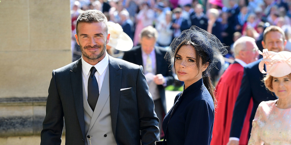 David and Victoria Beckham arrive at St George's Chapel at Windsor Castle for the wedding of Meghan Markle and Prince Harry. Saturday May 19, 2018. Ian West/Pool via REUTERS