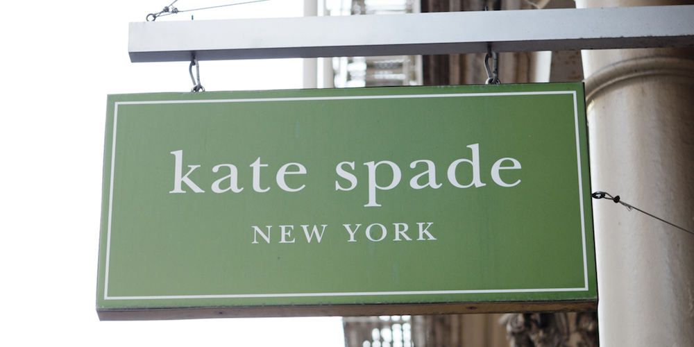 "New York, New York, USA - March 27, 2011: A Kate Space sign hangs in the Soho area of downtown Manhattan. Kate Spade is a well known designer of accessories and clothing."