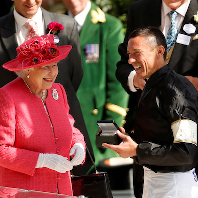 Horse Racing - Royal Ascot - Ascot Racecourse, Ascot, Britain - June 21, 2018   Britain's Queen Elizabeth presents Frankie Dettori with a medal for winning the 4.20 Gold Cup riding Stradivarius   Action Images via Reuters/Andrew Boyers - RC1AE94D6200