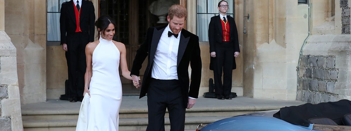 The newly married Duke and Duchess of Sussex, Meghan Markle and Prince Harry, leaving Windsor Castle after their wedding to attend an evening reception at Frogmore House, hosted by the Prince of Wales Windsor, Britain, May 19, 2018.  Steve Parsons/Pool via REUTERS - RC16A6C13BD0