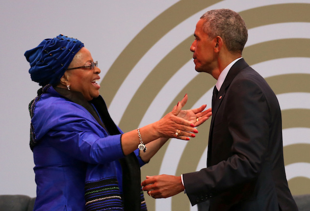 Former U.S. President Barack Obama is embraced by Nelson Mandela's widow Graca Machel after he to delivered the 16th Nelson Mandela annual lecture in Johannesburg, South Africa July 17, 2018. REUTERS/Siphiwe Sibeko