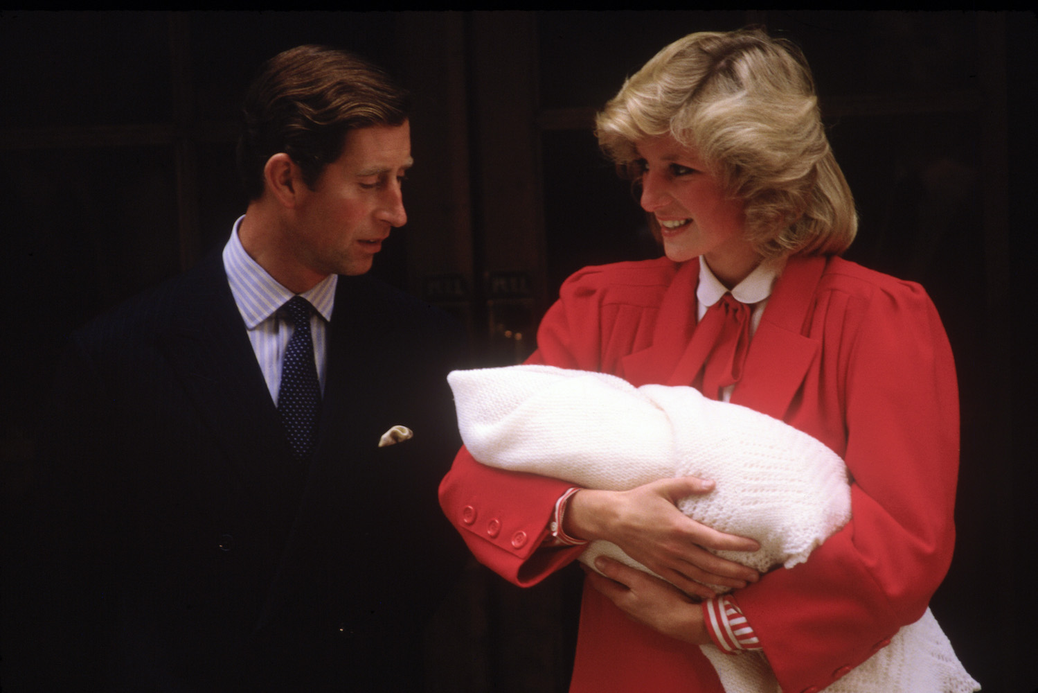 LONDON - SEPTEMBER 16:  Diana Princess of Wales and Prince Charles with new born Prince Harry, leave St.Mary's Hospital on September 16, 1984 in Paddington, London. Diana wore an oufit designed by Jan Van Velden. (Photo by David Levenson/Getty Images)