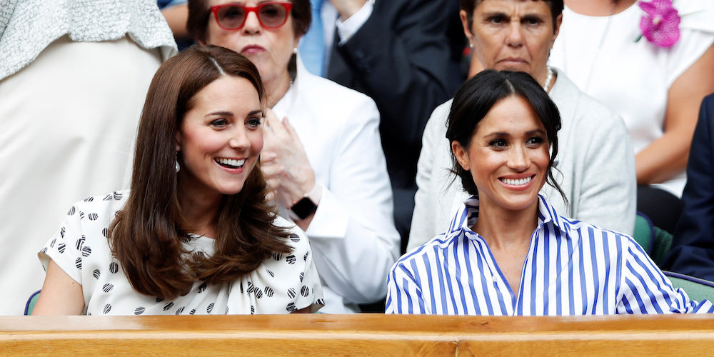 Tennis - Wimbledon - All England Lawn Tennis and Croquet Club, London, Britain - July 14, 2018. Britain's Catherine the Duchess of Cambridge and Meghan the Duchess of Sussex watch Serena Williams of the U.S. play the women's singles final against Germany's Angelique Kerber  .   Pool via Reuters - RC11B49DBA50