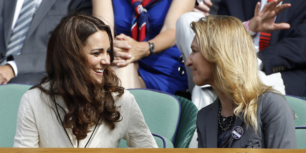 Britain's Catherine, Duchess of Cambridge (L) speaks to former tennis player Steffi Graf on Centre Court for the men's quarter-final tennis match between Andy Murray of Britain and David Ferrer of Spain at the Wimbledon tennis championships in London July 4, 2012.           REUTERS/Stefan Wermuth (BRITAIN  - Tags: ENTERTAINMENT FASHION SOCIETY ROYALS SPORT TENNIS)   - LR2E87419GYZT