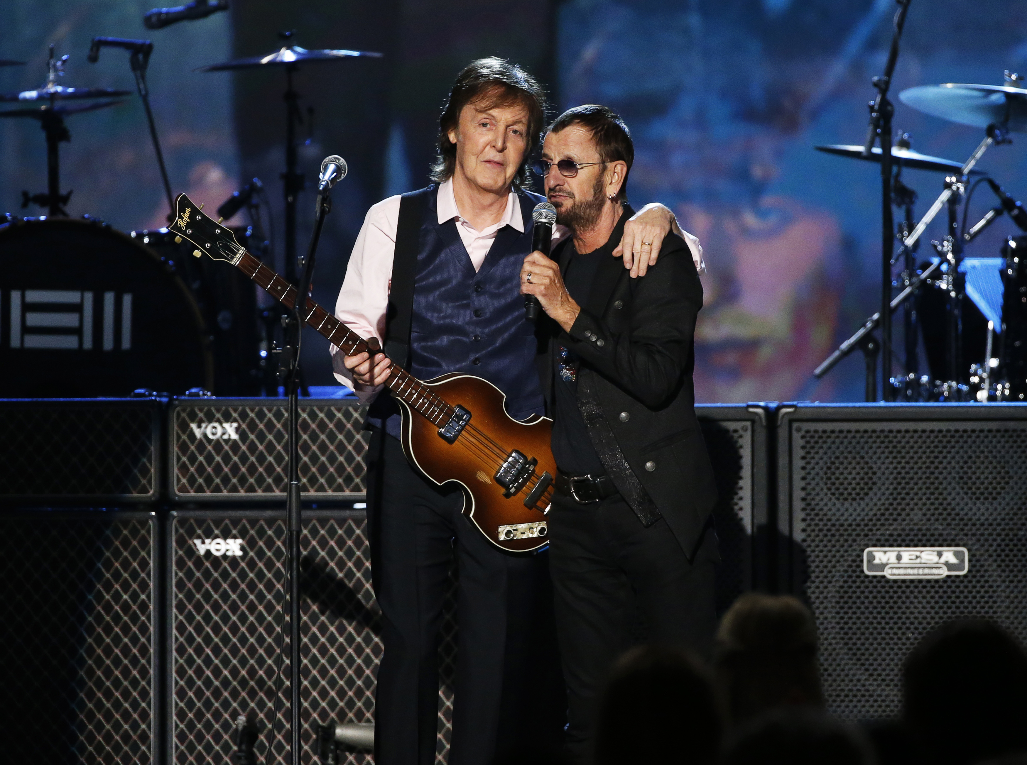 Paul McCartney (L) and Ringo Starr perform during the taping of "The Night That Changed America: A GRAMMY Salute To The Beatles", which commemorates the 50th anniversary of The Beatles appearance on the Ed Sullivan Show, in Los Angeles January 27, 2014.   REUTERS/Mario Anzuoni (UNITED STATES - Tags: ENTERTAINMENT) - GM1EA1S16VV01