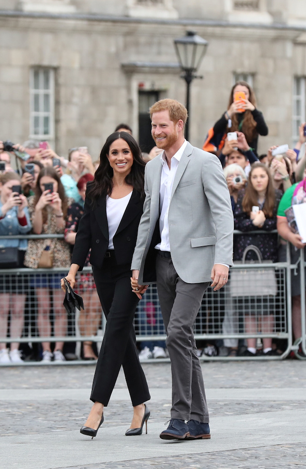 Britain's Prince Harry and Meghan, the Duchess of Sussex walkabout during a visit to Trinity College in Dublin, Ireland, July 11, 2018. Gareth Fuller/Pool via REUTERS