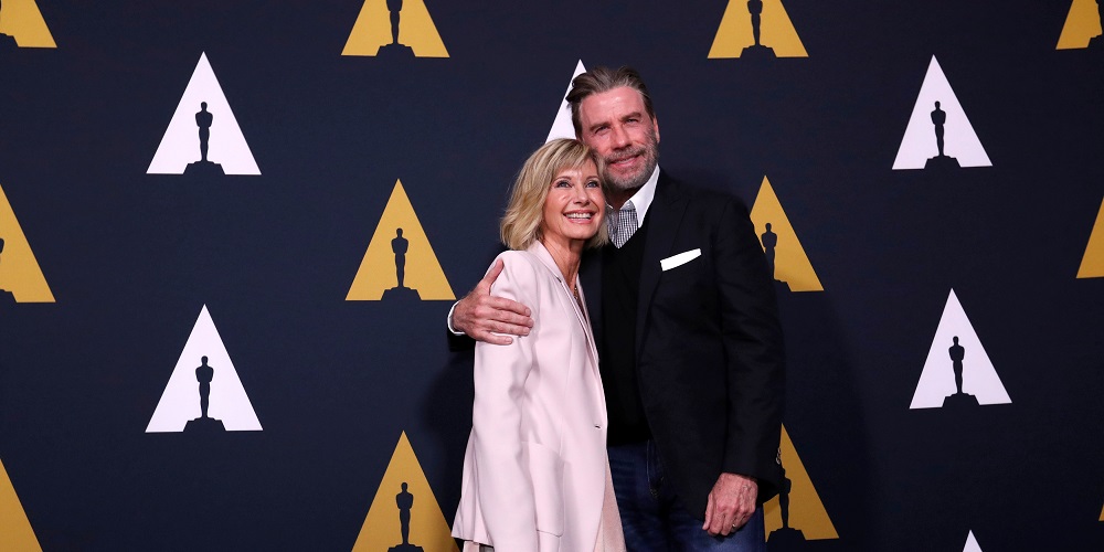 John Travolta and the late Olivia Newton-John pose at a 40th anniversary screening of "Grease" at the Academy of Motion Picture Arts and Sciences in Beverly Hills, California, U.S., August 15, 2018. REUTERS/Mario Anzuoni