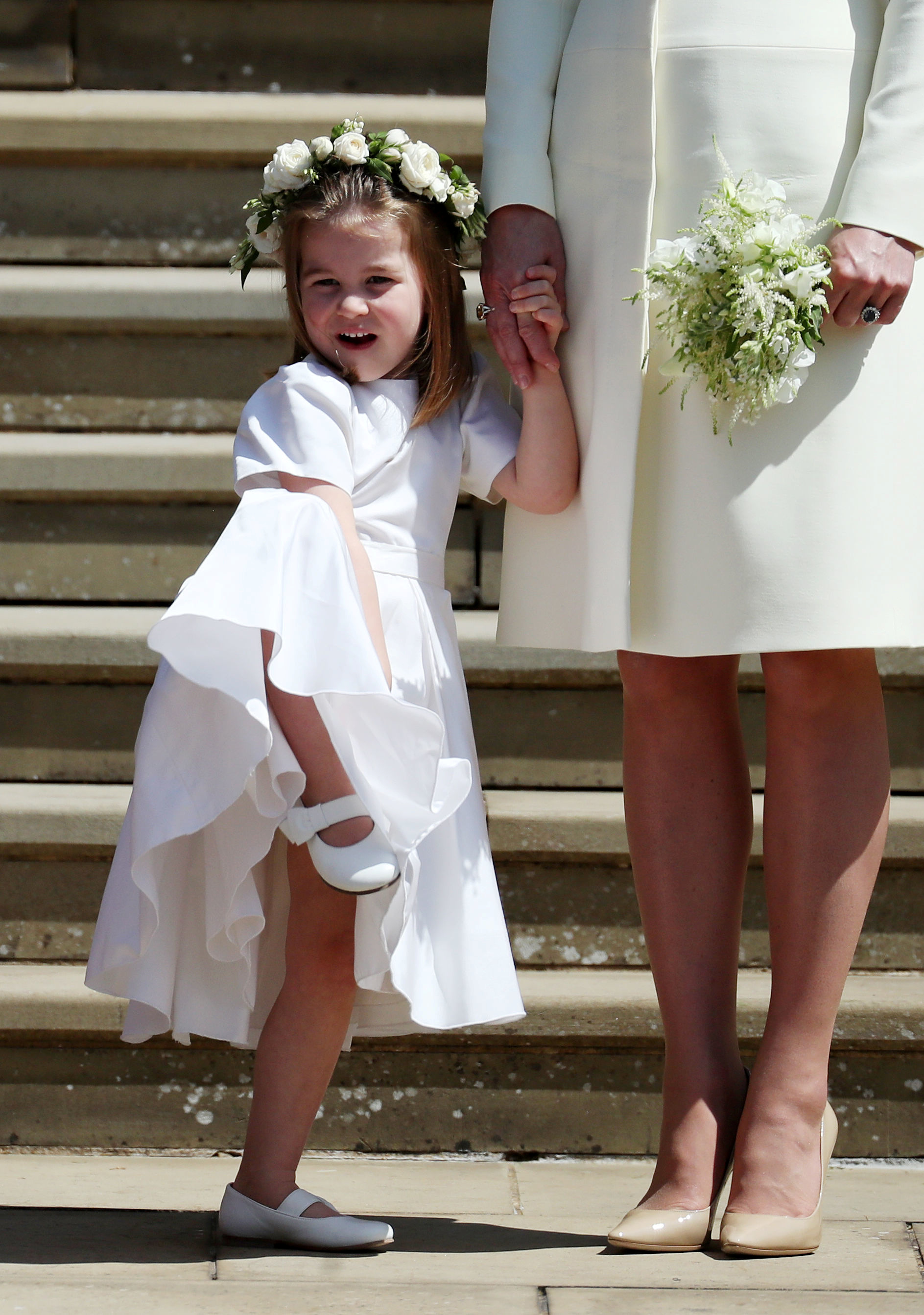 Princess Charlotte on the steps of St George's Chapel in Windsor Castle after the wedding of Prince Harry and Meghan Markle in Windsor, Britain, May 19, 2018. Jane Barlow/Pool via REUTERS - RC1305F00DB0