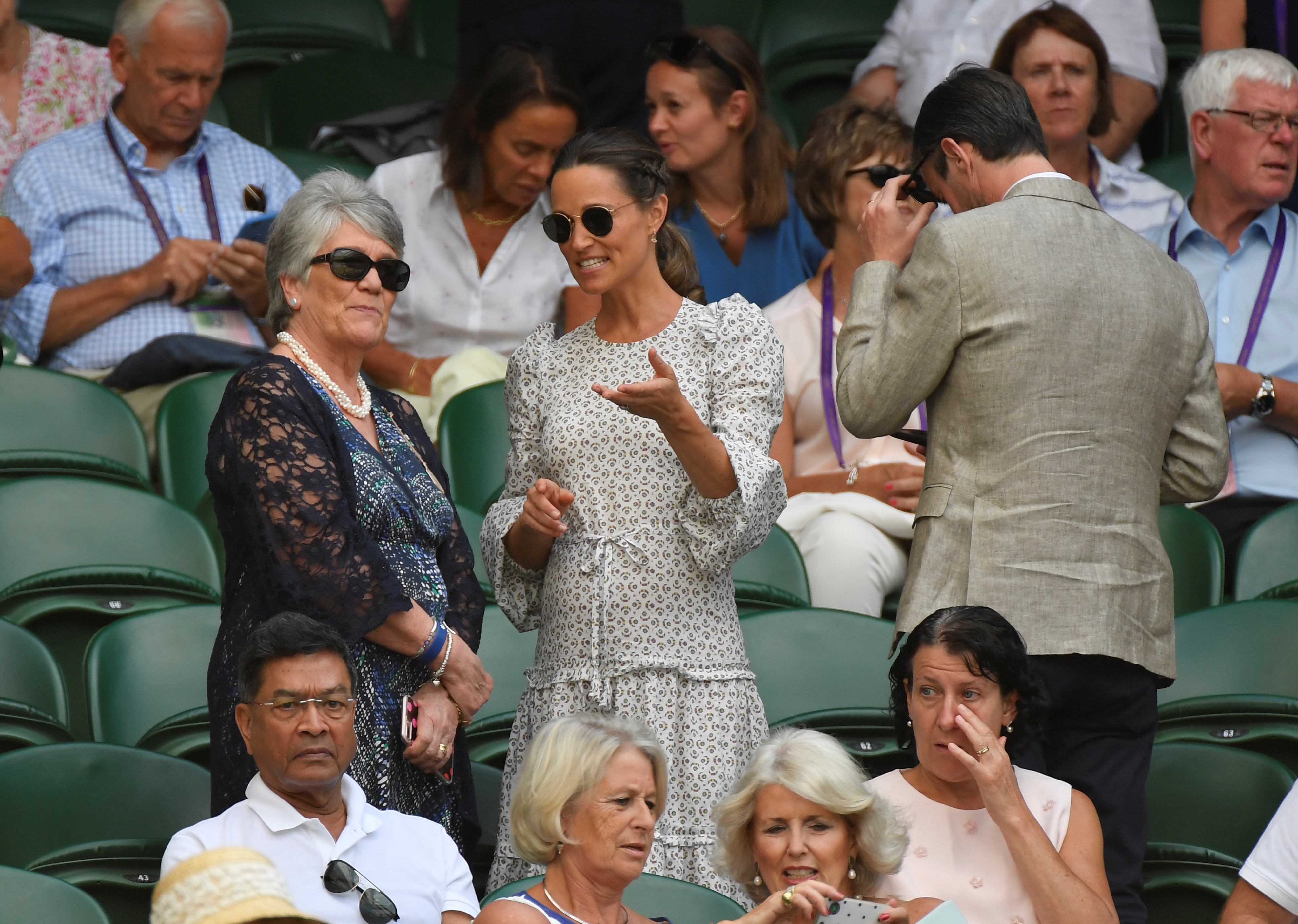 Tennis - Wimbledon - All England Lawn Tennis and Croquet Club, London, Britain - July 13, 2018  Pippa Middleton with her husband James Matthews in the stands on centre court  REUTERS/Toby Melville - RC1FA03E4B00