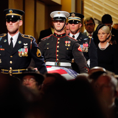 U.S. Senator John McCain's wife Cindy follows as an Honor Guard carries his casket into a memorial service in Phoenix, Arizona, U.S., August 30, 2018. REUTERS/Brian Snyder - HP1EE8U1CMTZS