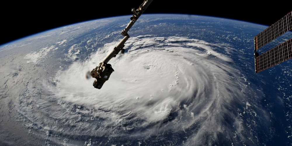 Hurricane Florence is seen from the International Space Station as it churns in the Atlantic Ocean towards the east coast of the United States, September 10, 2018.  NASA/Handout via REUTERS  ATTENTION EDITORS - THIS IMAGE WAS PROVIDED BY A THIRD PARTY - RC14042EB330