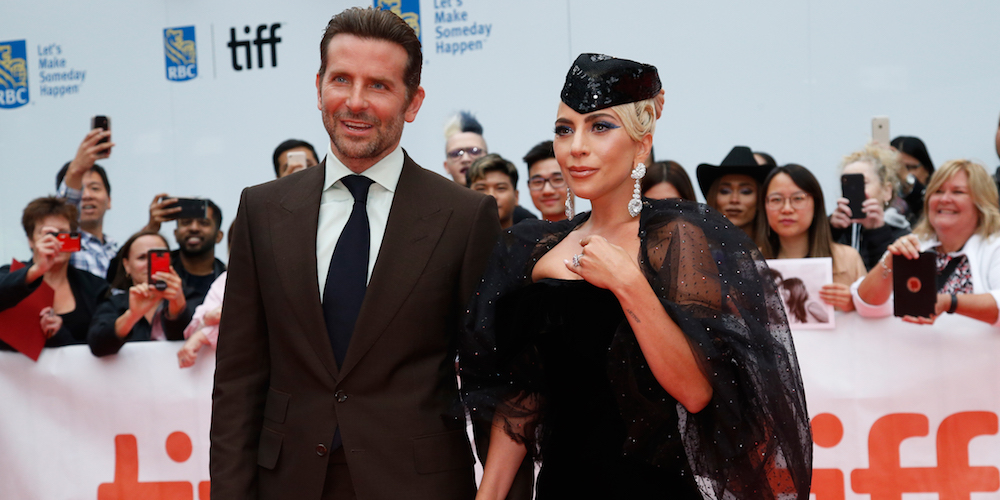 Actor Bradley Cooper poses with Lady Gaga at the world premiere of A Star is Born at the Toronto International Film Festival (TIFF) in Toronto, Canada, September 9, 2018. REUTERS/Mario Anzuoni - HP1EE991TZORC