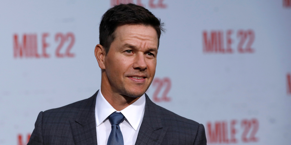 Cast member Mark Wahlberg poses at the premiere for "Mile 22" in Los Angeles, California, U.S., August 9, 2018. REUTERS/Mario Anzuoni